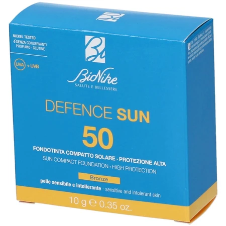 Defence sun 50 compact foundation n2 brons 10 g