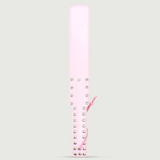 Pala de cuero con tachuelas y correa para la muñeca - Rosa