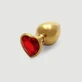 Metalen buttplug met grote hartvormige edelsteen - goud/rood