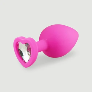 Plug anal de silicona de la colección Anal, tamaño grande, con joya en forma de corazón - Rosa/Transparente